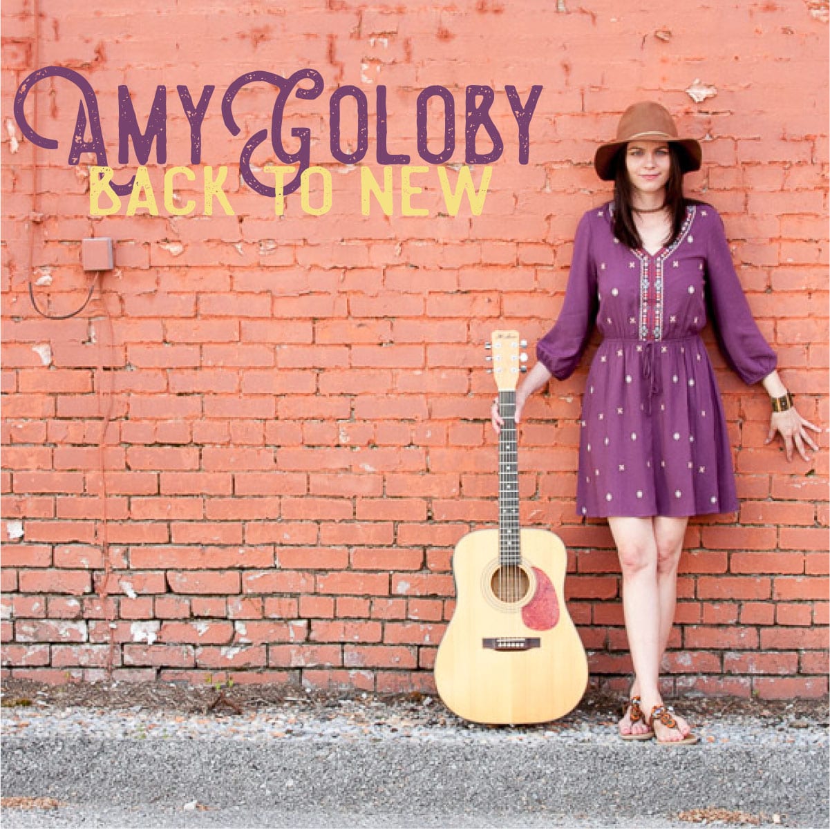 amy goloby back to new album cover pink brick purple dress